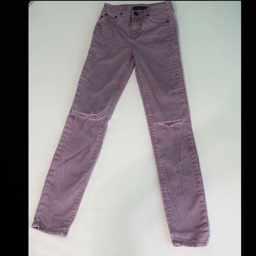 Grape purple skinny jeans with knees rips